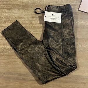 Zyia distressed copper leggings